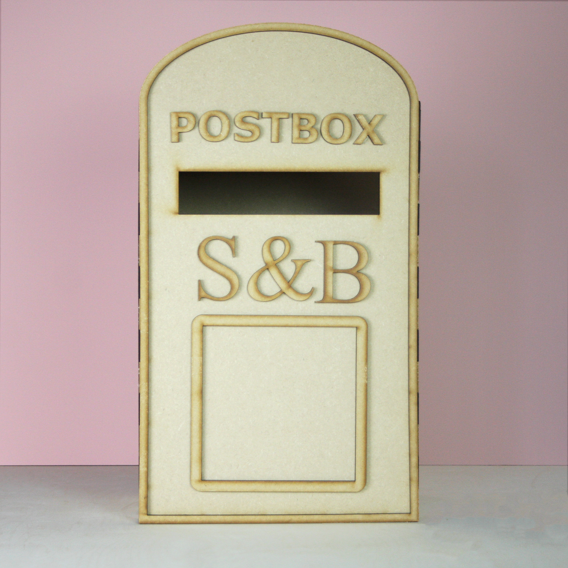 MDF postbox on pink background