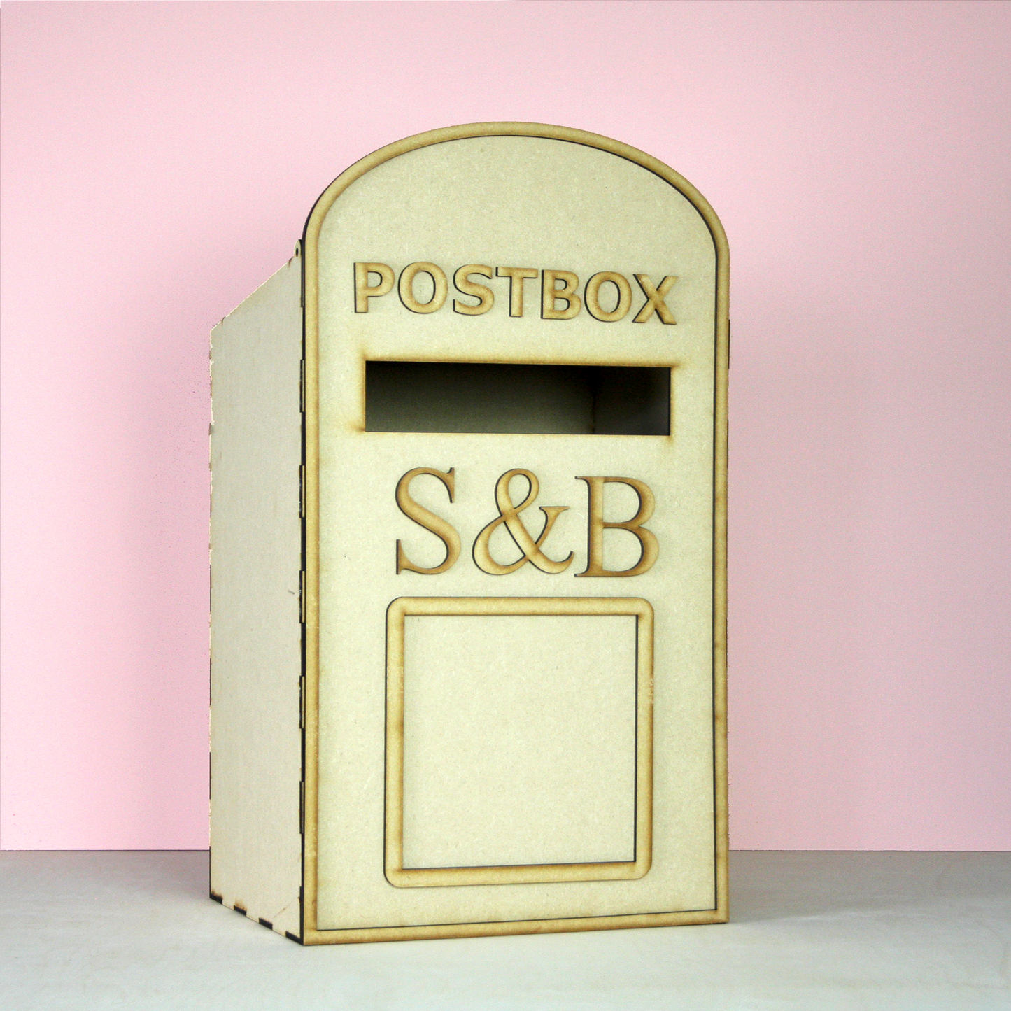 MDF postbox on pink background