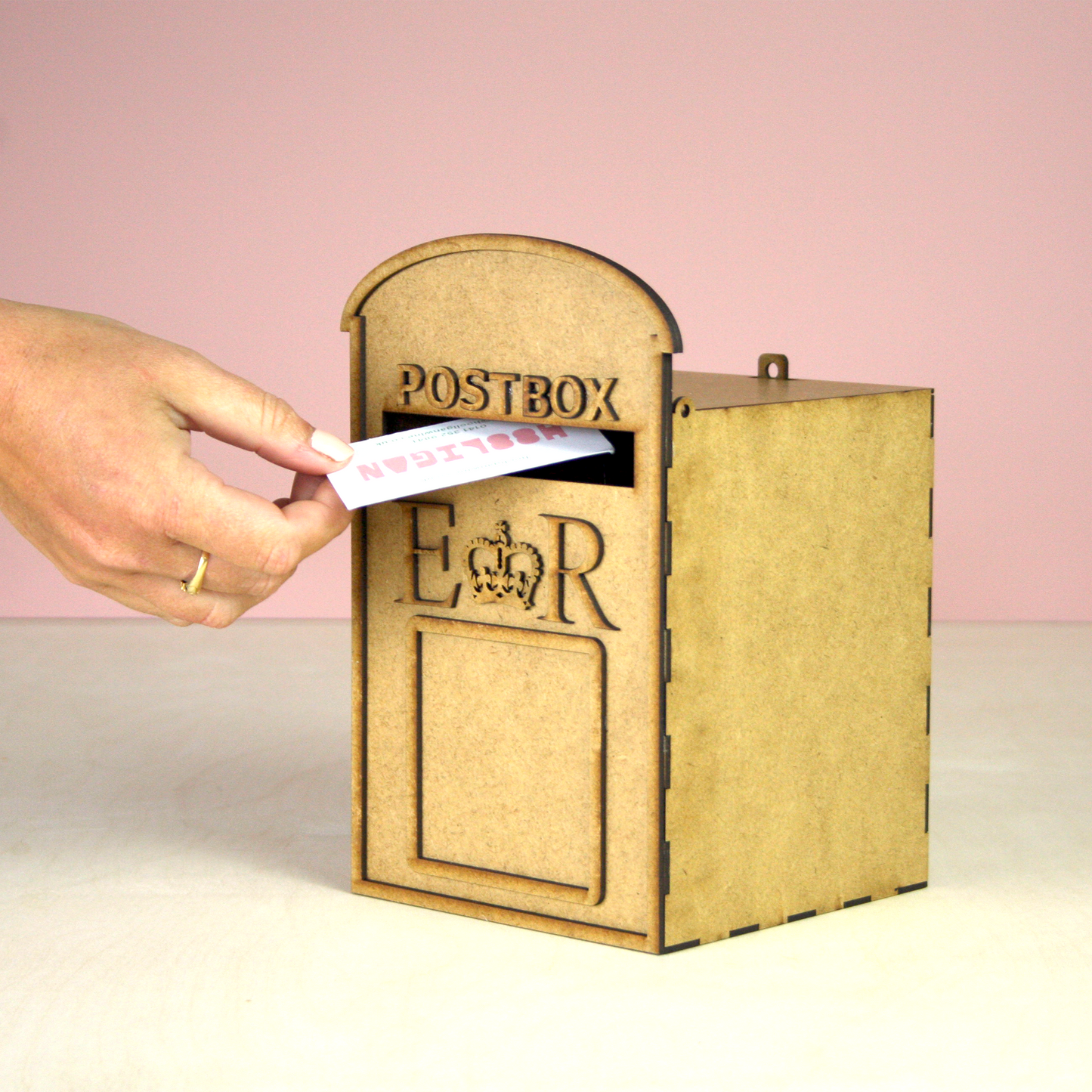 MDF postbox on pink background