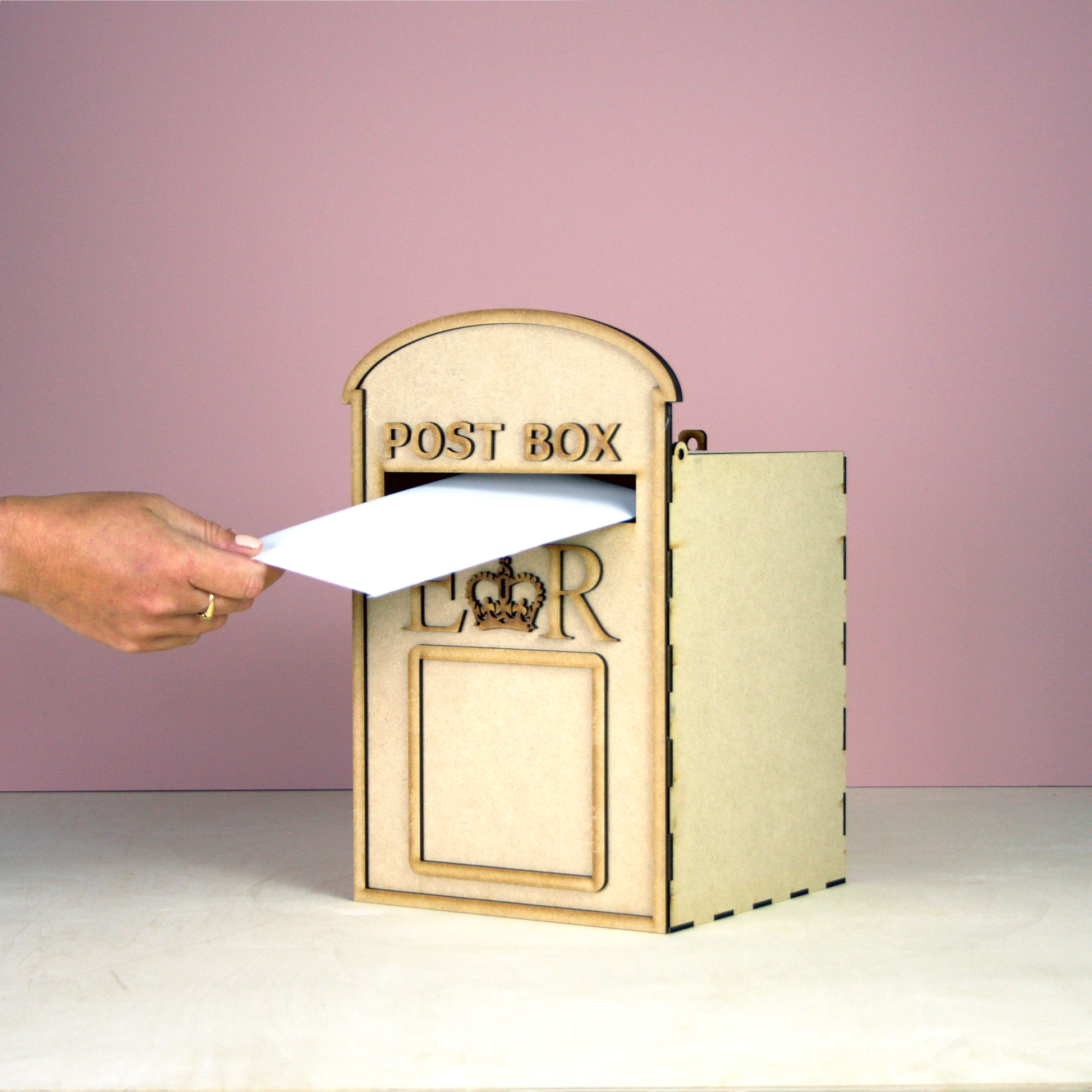 MDF postbox on pink background