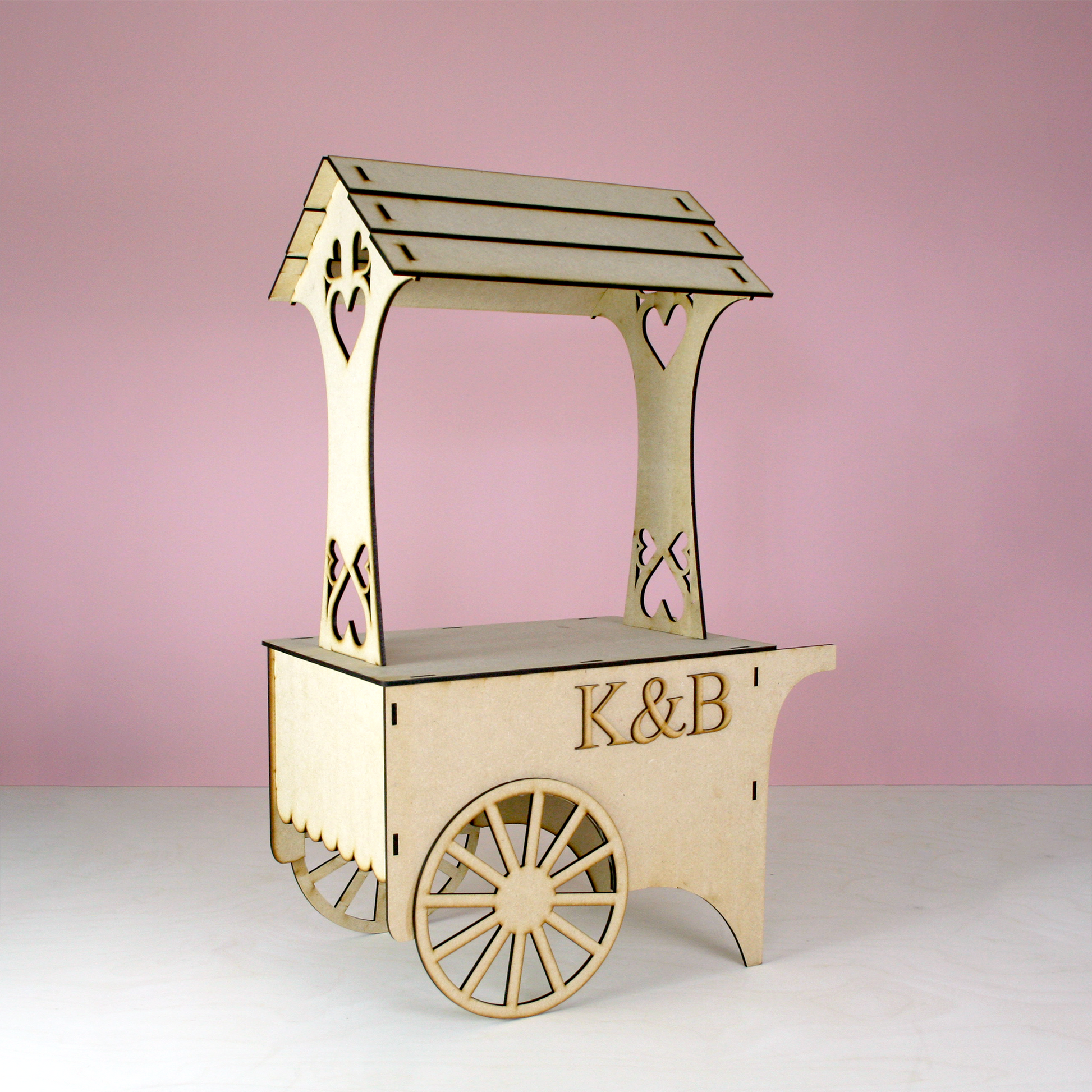 MDF Candy Cart with initials K&B in front of pink background